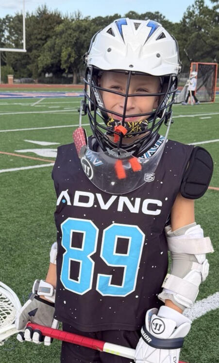 Bennett Walker, #89 goalie, in lacrosse gear
